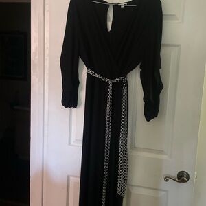 Elegant Black Dress with Patterned Belt